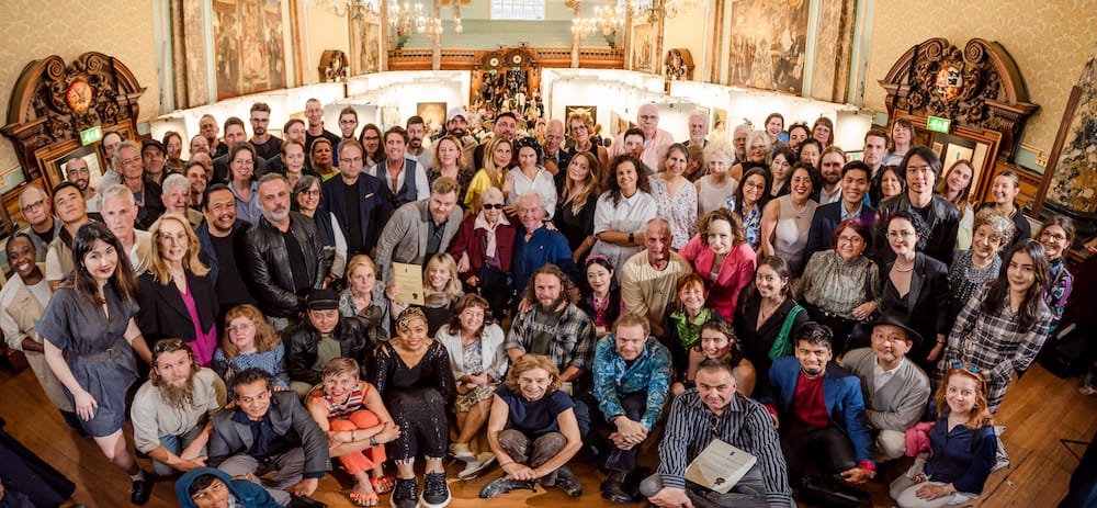 The 2023 exhibiting artists gathered for the group photograph.