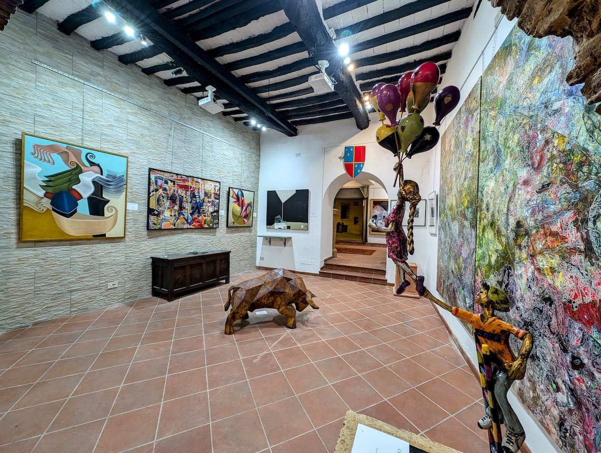 The far gallery at Chianciano, sculpture holding the floor.